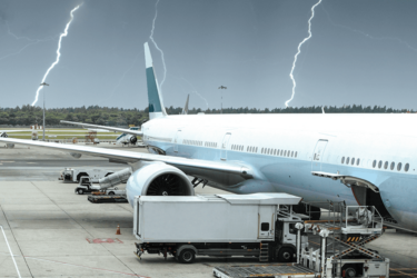 An airport experiencing lightning. AEM lightning detection solutions can help.